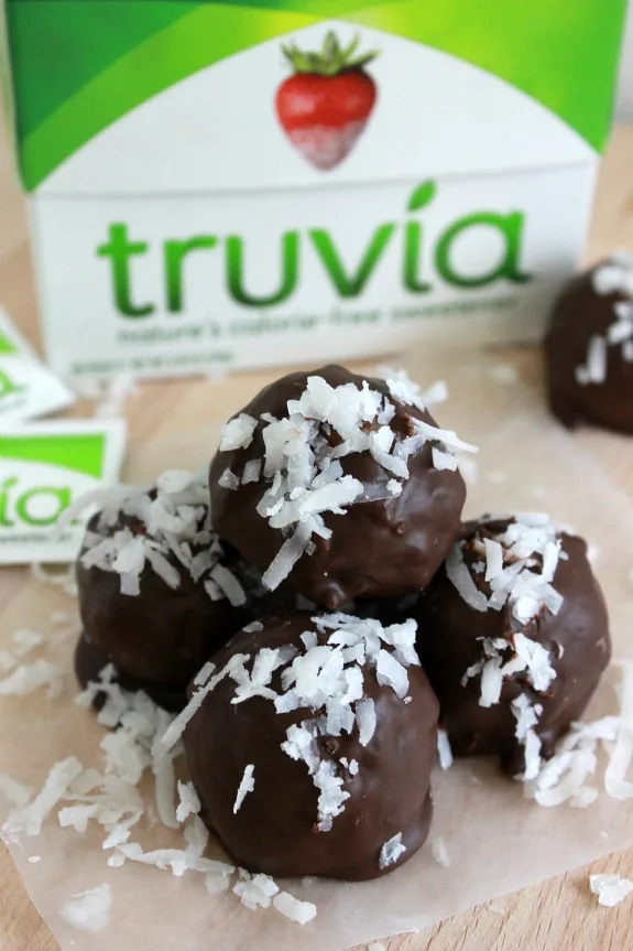 Dark Chocolate Coconut Truffles. An easy and simple recipe that combines coconut and dark chocolate for a deliciously rich and sweet treat. 