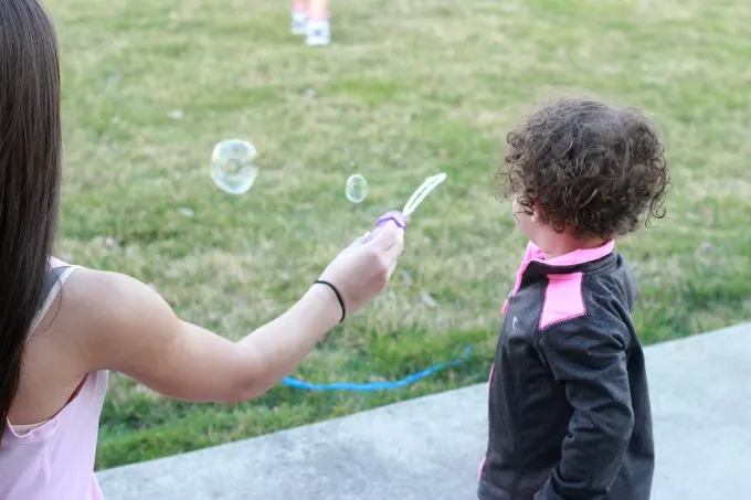 family-day-outdoors-bubbles
