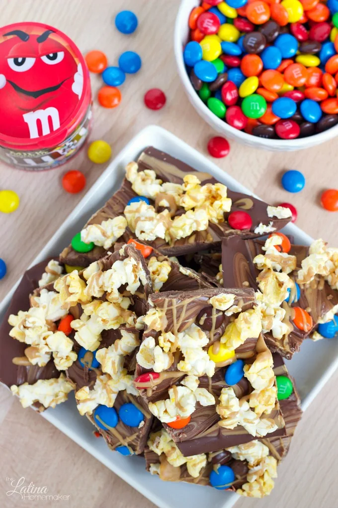 Movie Night Chocolate Bark-A chocolate peanut butter bark that is topped with popcorn and chocolate candies for a fun and delicious movie night snack!