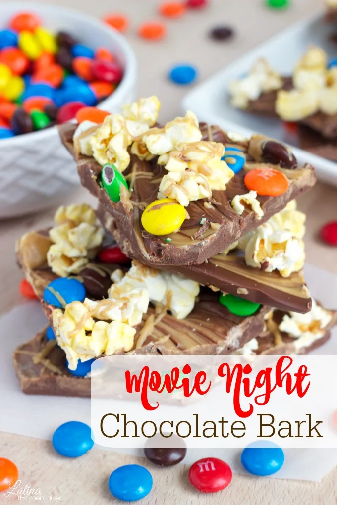 Movie Night Chocolate Bark-A chocolate peanut butter bark that is topped with popcorn and chocolate candies for a fun and delicious movie night snack!