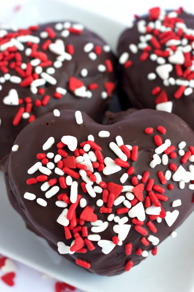 Dark Chocolate Raspberry Mini Cakes – A dark chocolate mini cake with a smooth raspberry cream cheese filling. Perfect for Valentine's Day and beyond! 
